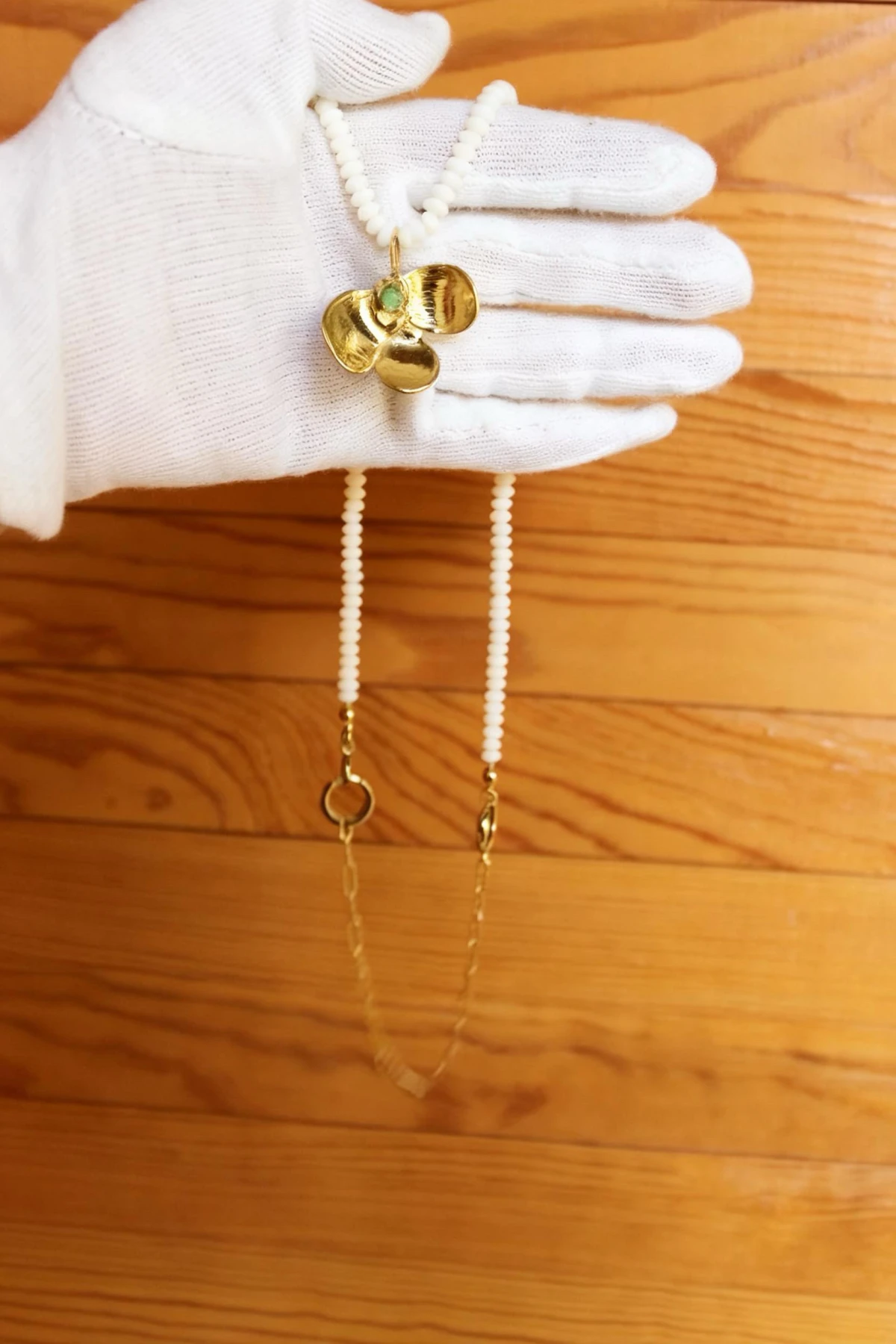 2 w 1. Kwiat nadziei z oliwinem na koralu naturalnym oraz gruba bransoletka